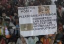 <div>‘Respected Modi ji, please save West Bengal’ poster at PM’s Asansol rally draws attention</div>