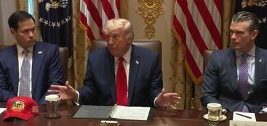 Trump says will not rush into Iran deal over midterm concerns