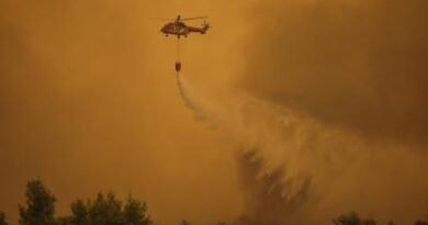 Two firefighting helicopters collide while battling wildfire in Greece